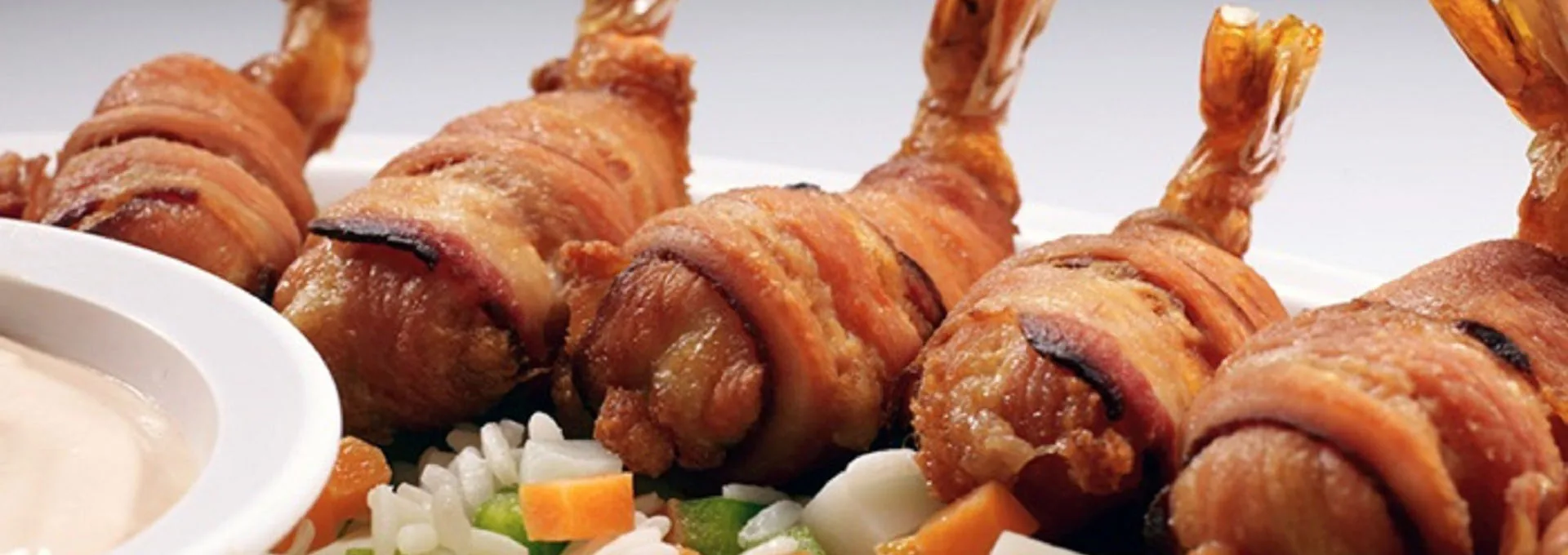 Prawns wrapped in bacon